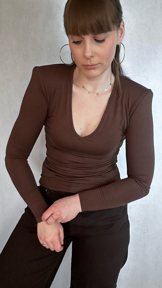 Bluzka Linea z podniesionym ramionami